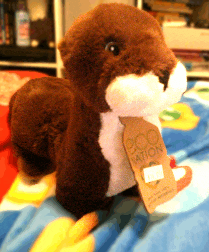 a stuffed animal with a tag that says ' eco nation ' on it