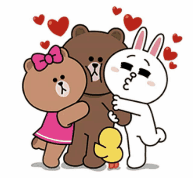 a brown bear a white rabbit and a duck are hugging each other