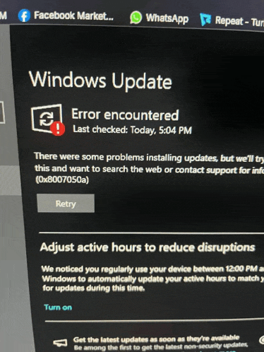 a computer screen shows a windows update error encountered