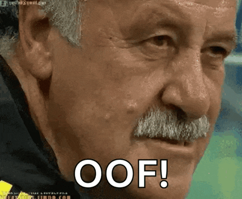 a man with a mustache is making a funny face and says oof