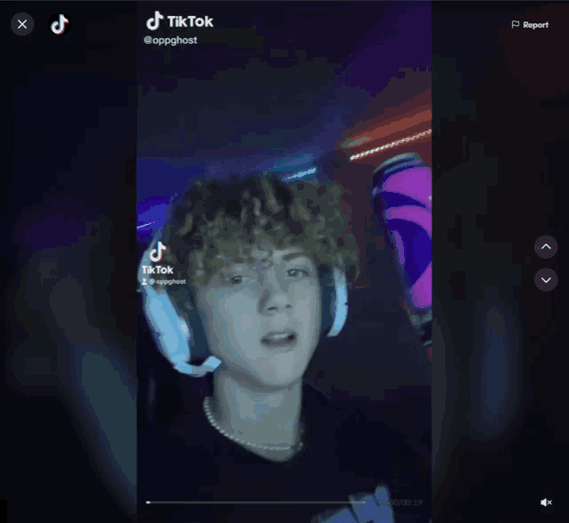 a tiktok video of a young man with headphones