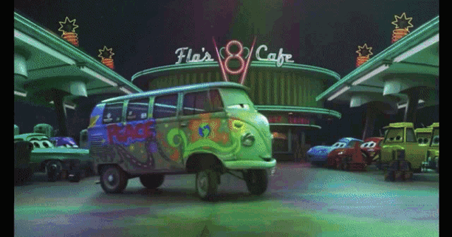 a green van is parked in front of a restaurant called fla 's 8 cafe