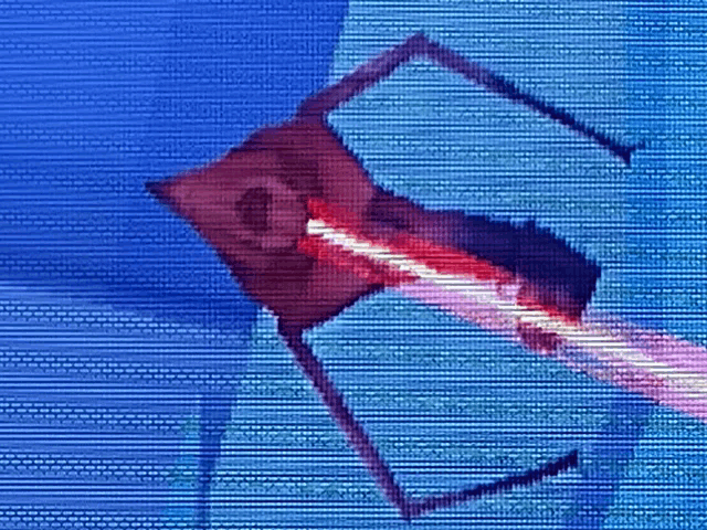 a computer screen shows a red object with a light coming out of it 's mouth