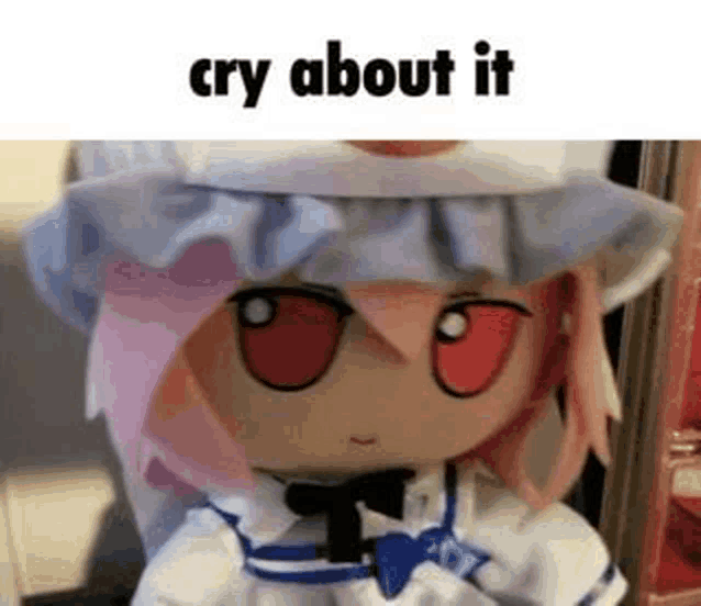 a stuffed animal doll with pink hair and red eyes is crying about it .