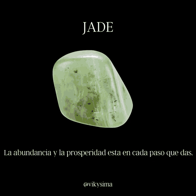 the word jade is on a black background next to a green rock