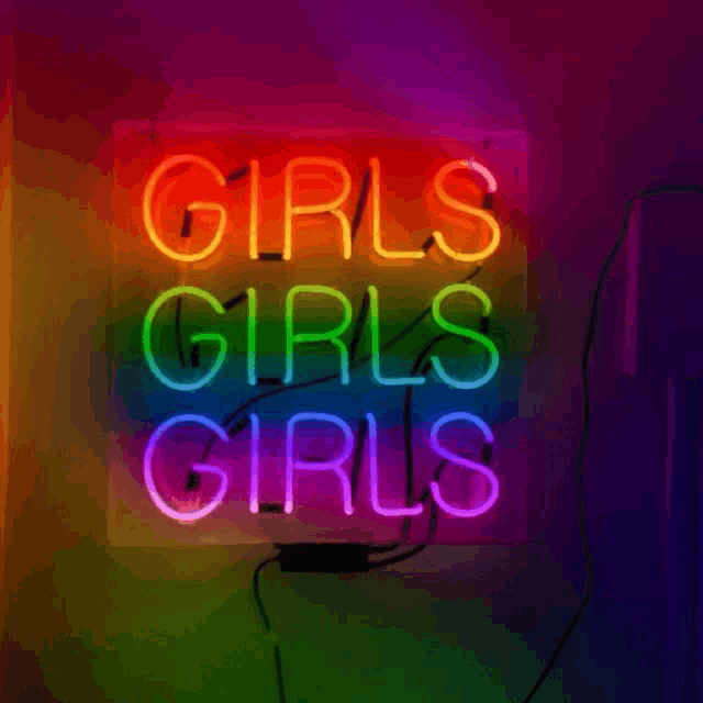 a neon sign that says girls girls girls on it