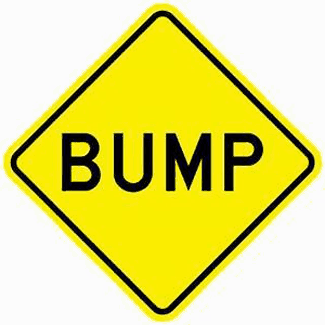 a yellow diamond shaped sign with the word bump written on it .