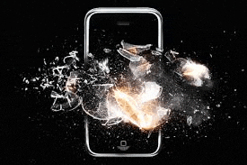 a broken cell phone is surrounded by pieces of glass and smoke .