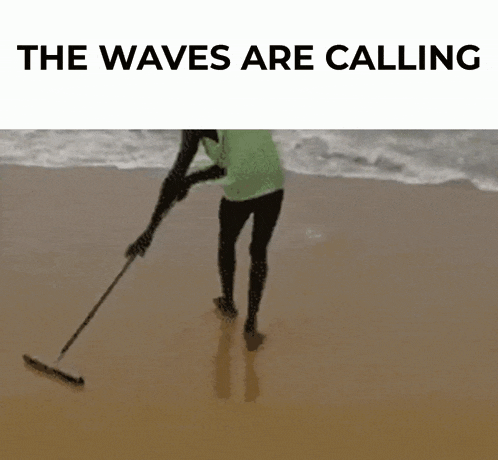 a man is sweeping the sand on a beach with the words " the waves are calling " above him