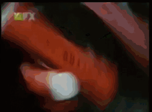 a cartoon of batman and robin running together on a green field .