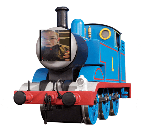 a blue train with a picture of a boy on the front of it