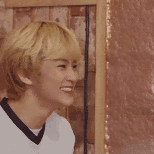 a close up of a person 's face with their mouth open