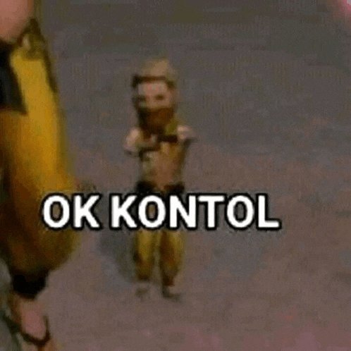 a cartoon character is walking down the street with the words `` ok kontol '' written on the ground .