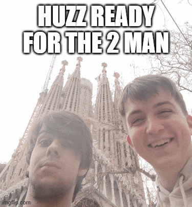 two young men are smiling in front of a building that says huzz ready for the 2 man on it