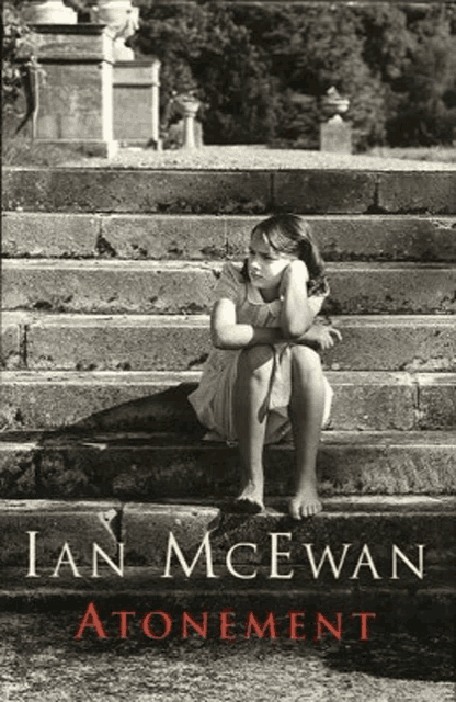 a black and white photo of a little girl sitting on steps .