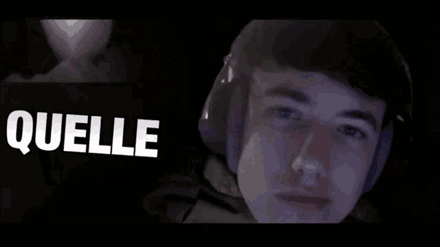 a man wearing headphones with the word strange on the bottom right
