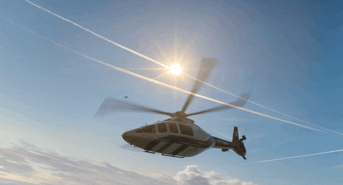 a helicopter flying in the sky with the sun shining brightly