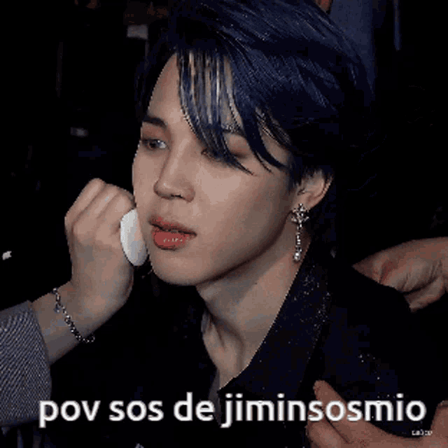 a close up of a person 's face with the words pov sos de jiminsosmio above it