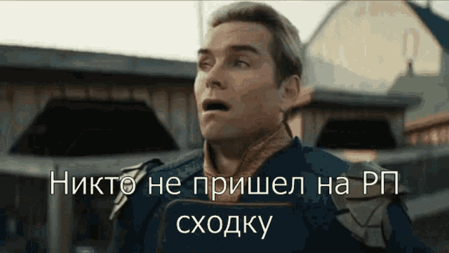 a man in a superhero costume is standing in front of a building with a surprised look on his face .