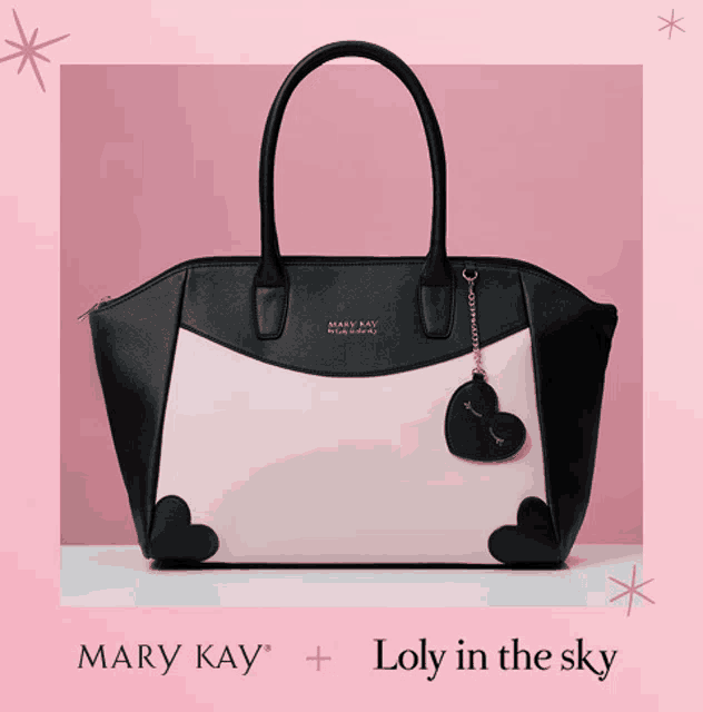 a black and pink mary kay purse with lolly in the sky written below it