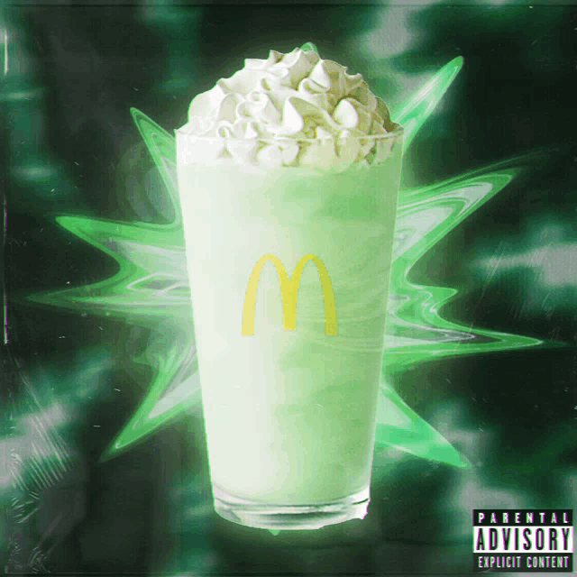 a mcdonald 's milkshake with whipped cream and a parental advisory label