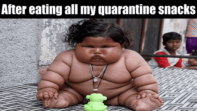 a picture of a baby with the caption after eating all my quarantine snacks on it