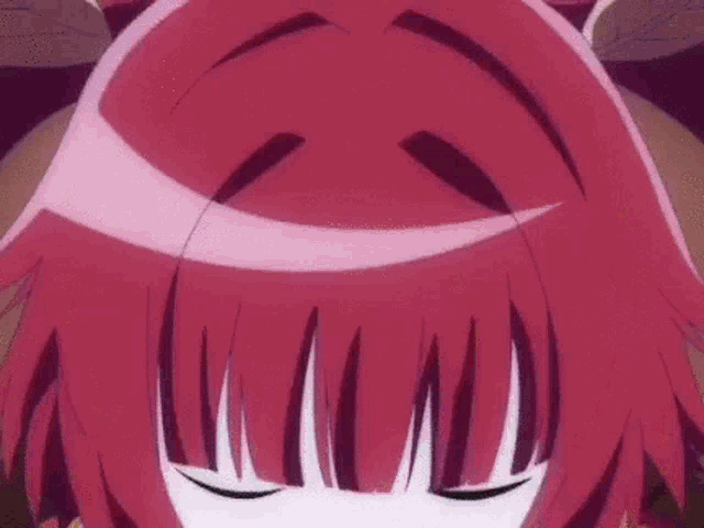 a close up of a person 's face with their eyes closed