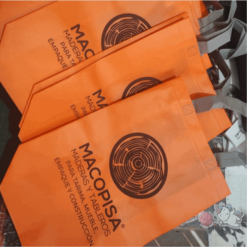 a bunch of orange bags that say macopisa