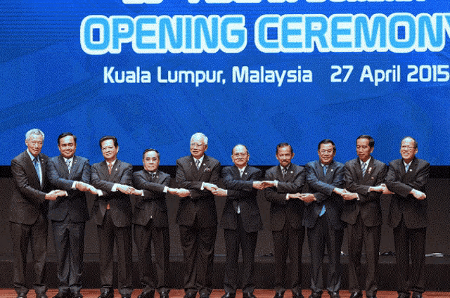 a group of men standing in front of a sign that says opening ceremony