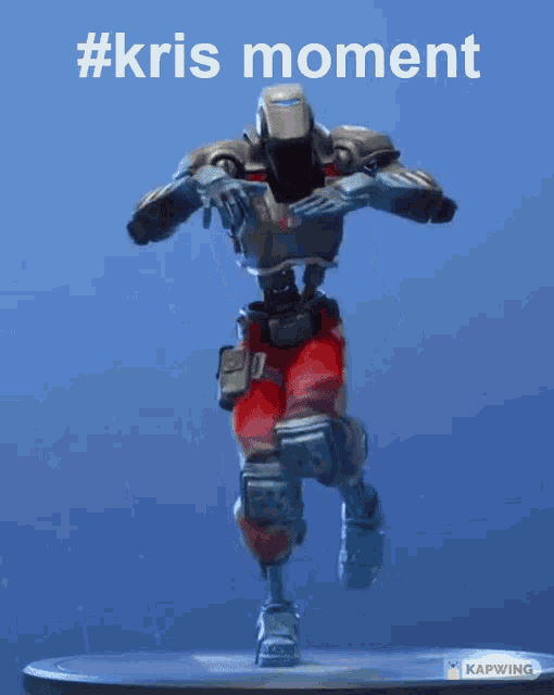 a robot is dancing with the words #kris moment behind it