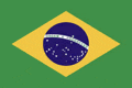 a green and yellow flag with a blue and white circle in the middle