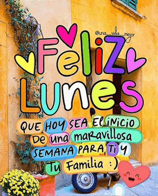 a colorful sign that says feliz lunes in front of a yellow building