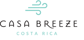 a logo for casa breeze costa rica with a wind blowing symbol