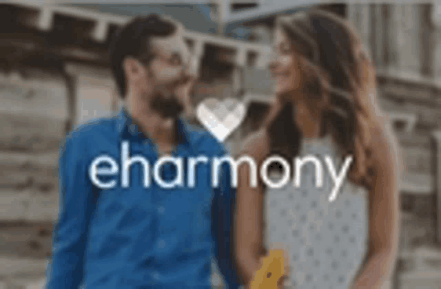 a man and a woman are standing next to each other and the logo for eharmony is in the background .