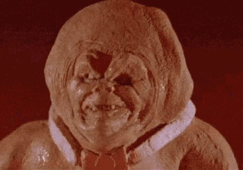 a close up of a person with a hood on