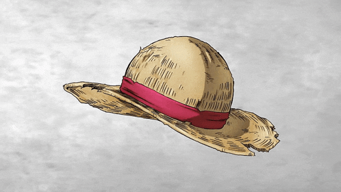 a straw hat with a red ribbon on it