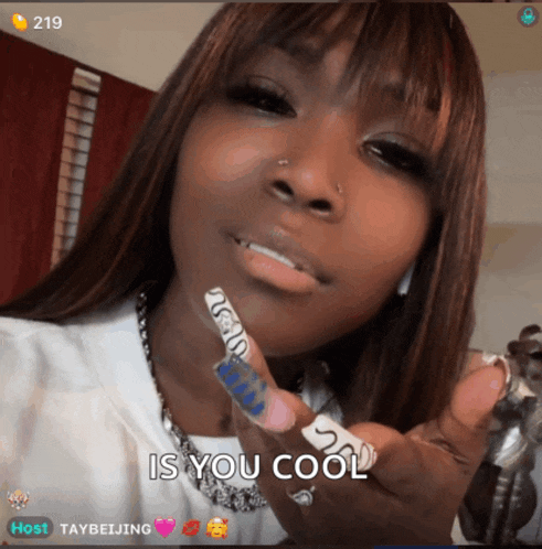 a woman holding a cigarette with the words " is you cool " written on it