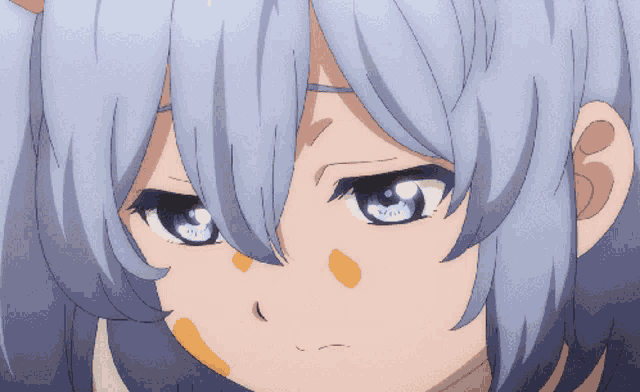 a close up of a girl 's face with blue hair and yellow spots on her face