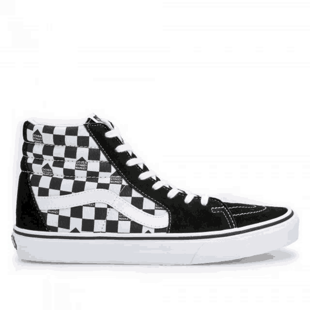 a pair of black and white checkered vans shoes