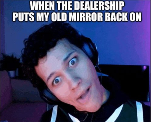 a man wearing headphones is making a funny face with the caption when the dealership puts my old mirror back on