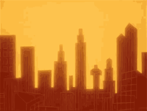 a silhouette of a city skyline at sunset