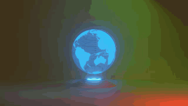 a glowing blue globe is on a stand in a dark room