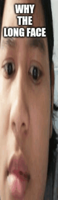 a close up of a person 's face with a caption that says " why the long face "