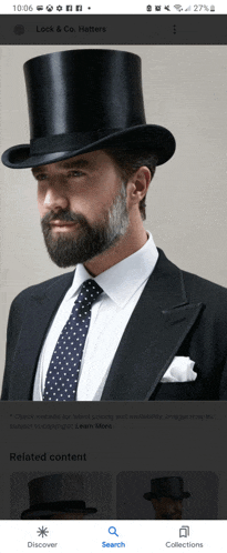 a man with a beard wearing a top hat and a suit