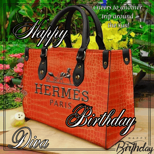 an orange hermes paris purse is on a birthday card