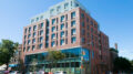 Exterior of the Sunset Park Library and Apartments, via Fifth Avenue Committee