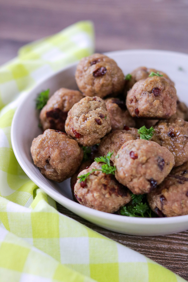 meatballs with dried cranberries in a bowl