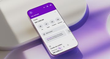 Imagem de um celular com a página principal do aplicativo do nubank aberta