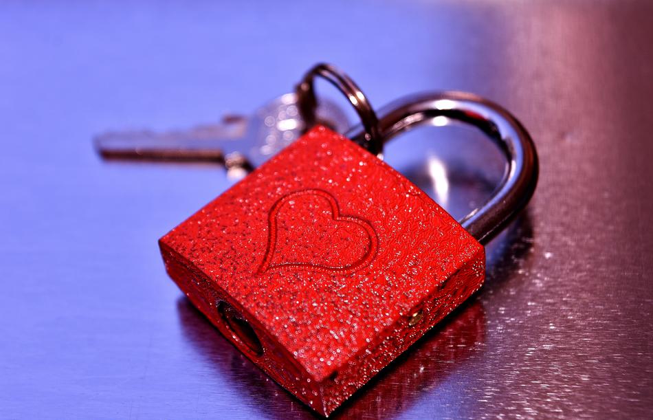 red padlock with a key