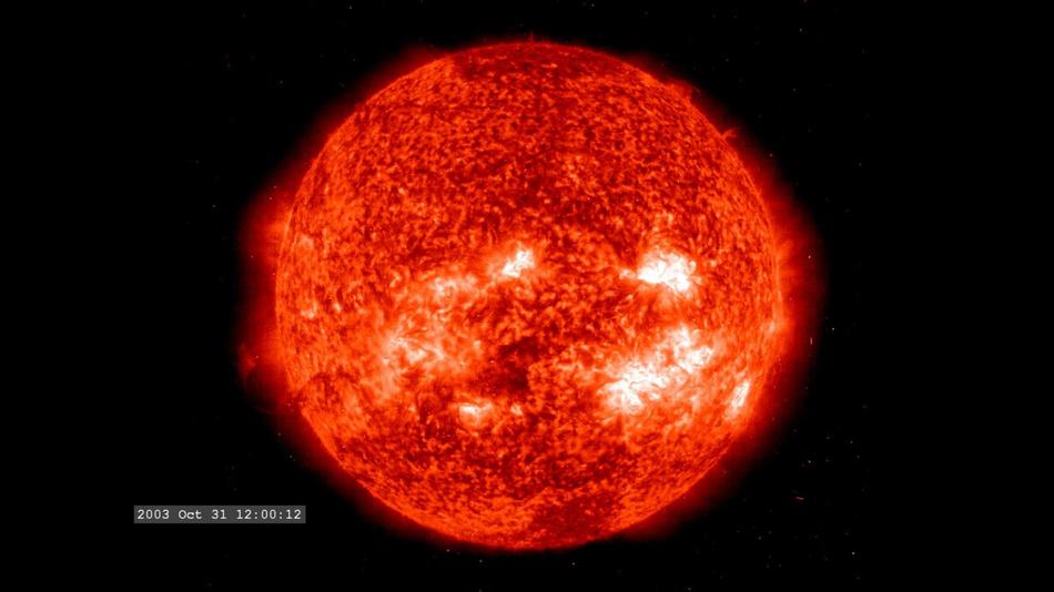 Red solar flare in space